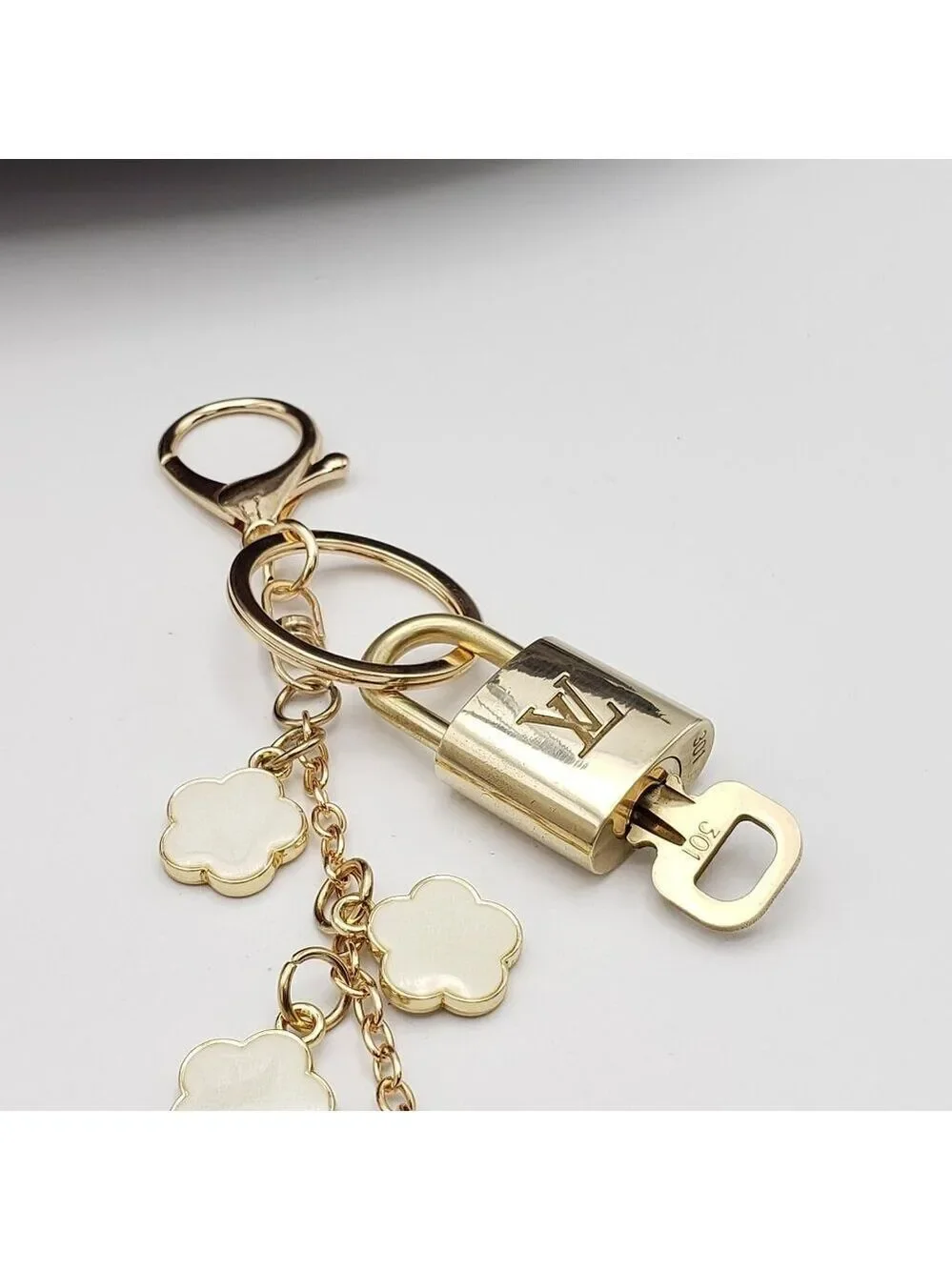 Authentic Louis Vuitton Lock & Key with Unbranded Flower Charm, Keychain